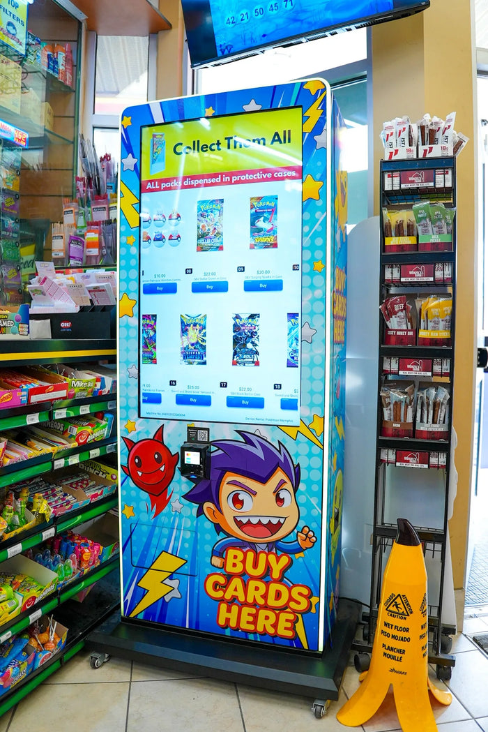 VTM Pokémon trading card kiosk beside retail shelves